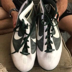 Green and white Nike basketball high-tops
